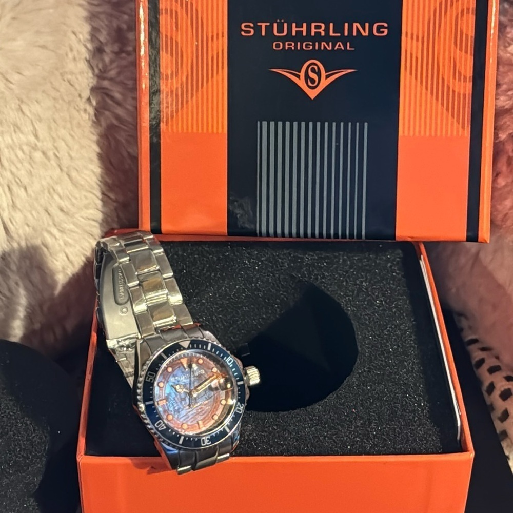 NIB STUHRLING Original Ladies Watch with original paperwork/Silvertone /Drk Blue